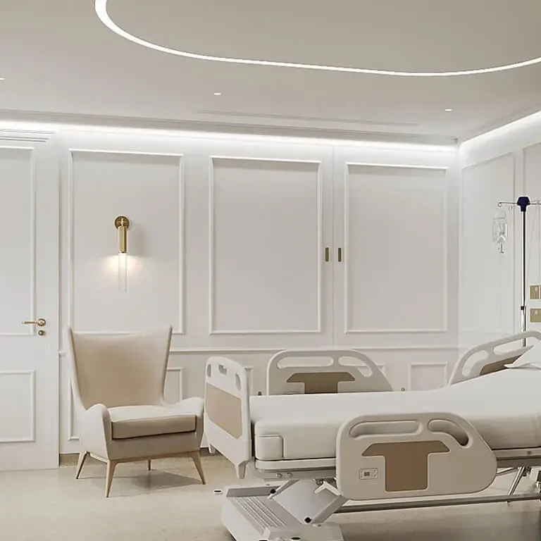 A room in a private hospital, shown a bed and decor with feature lighting